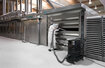 Průmyslový vysavač Ruwac R01 A pro oblasti StaubEx vysává moučný prach ve velkopekárně.